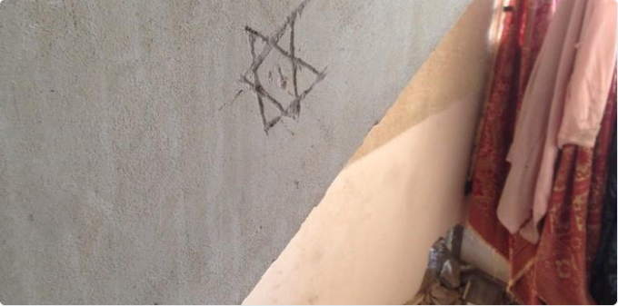 56_Soldiers_vandalized_the_homes_they_occupied_with_this_symbol